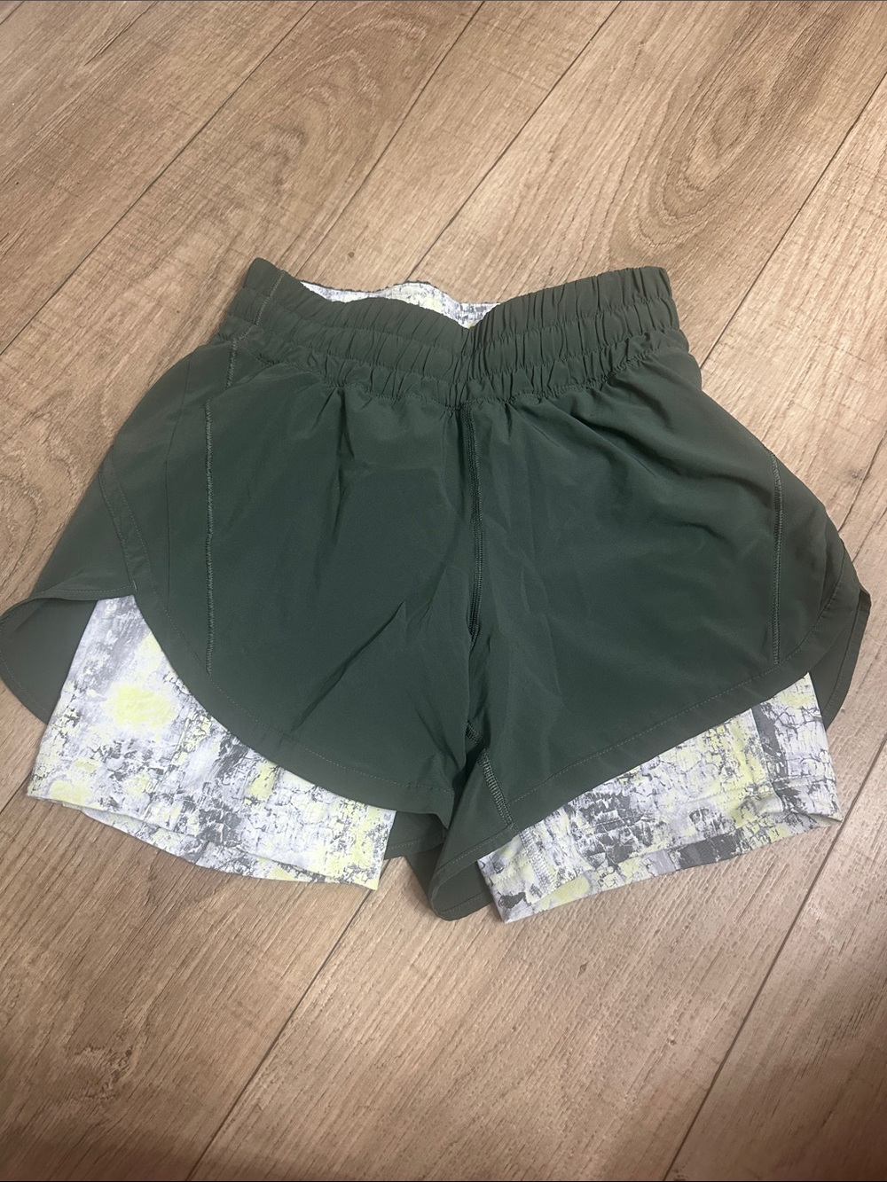 Green Lululemon Track That 2 in 1 shorts with built in contrasting liner shorts